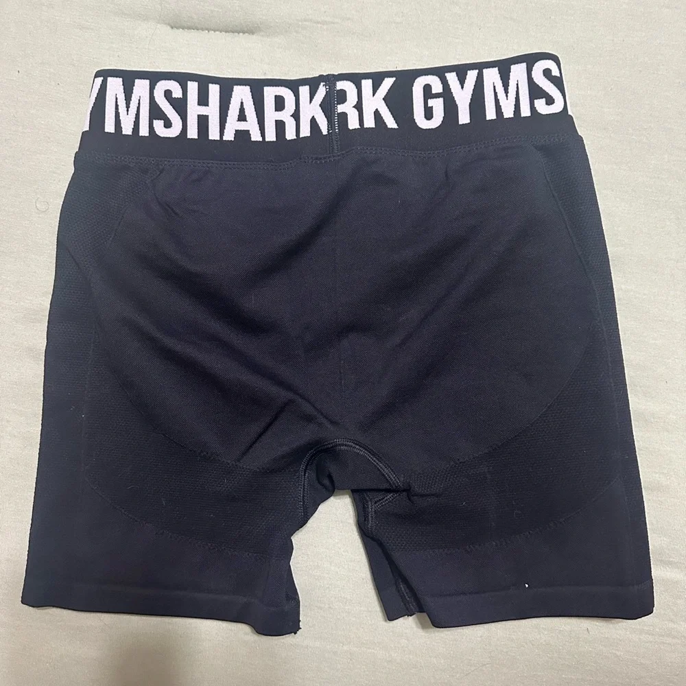 Gymshark Black Bike Shorts with Light Pink Logo Waistband